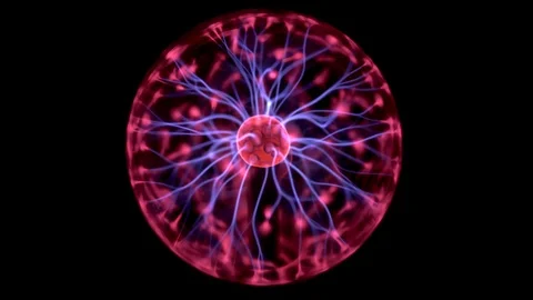 Plasma ball gives out small lightning. Experiments with electricity in the dark. Stock Footage 126390690
