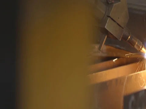 Plasma cutter cutting through hot metal, dripping metal Stock Footage 75406154