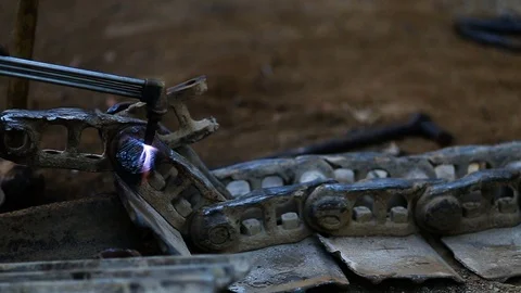 Plasma cutter slicing through hard steel plate fast. Cutting a decoration or Stockbeeldmateriaal 74944375