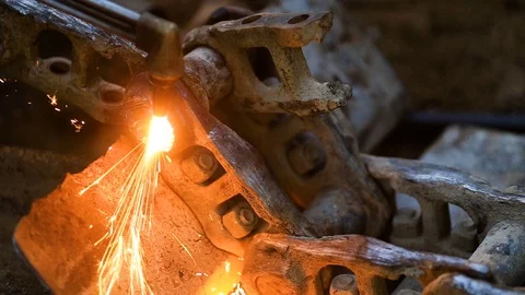 Plasma cutter slicing through hard steel plate fast. Cutting a decoration or Stock Footage 74944476
