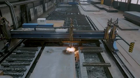 Plasma Cutting Machine Cutting Steel Plate, Metal Fabrication Hall, Wide Shot Stock Footage 341527852