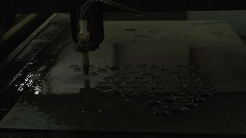 Plasma cutting machine for metal, thick sheet of metal lies in water tank Stock Footage 120062803