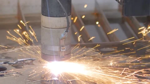 Plasma cutting machine working with sheet metal with sparks at factory: close up Stock Footage 145220398