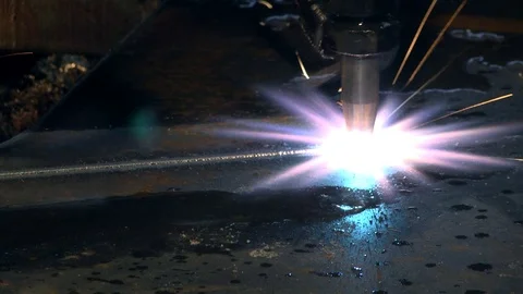 Plasma cutting metal on automatic laser machine. Sparks fly from laser. Stock Footage 122453790