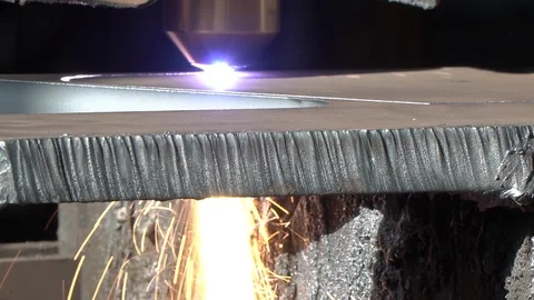 Plasma cutting of metal with a sparks on an automatic cnc machine Stock Footage 118237046