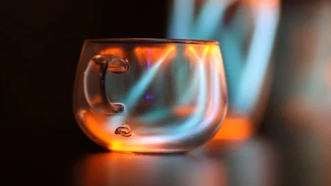 Plasma globe light in a cup, magic glowing object on the table Stock Footage 126886384