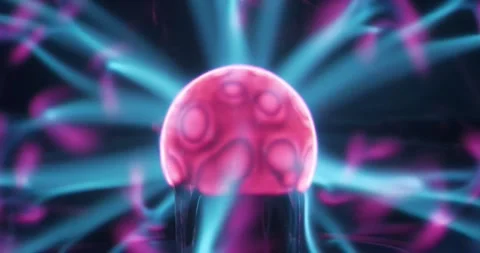 Plasma globe or plasma lamp. Lightning plasma ball close-up on black background Stock Footage 307845553