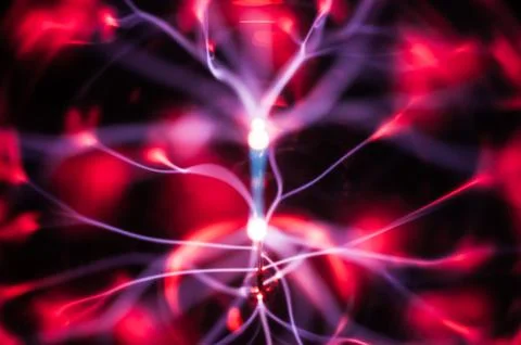 Plasma light beams in the darkness Stock Photos