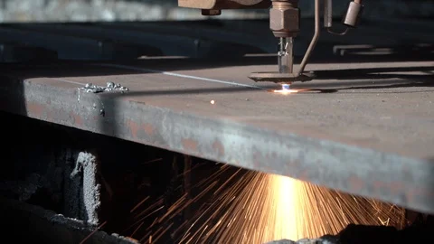 Plasma machine cuts metal through creating sparks closeup Stock Footage 118523475