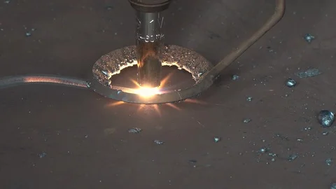Plasma torch arc cuts metal creating melted dross close view Stock Footage 118523826