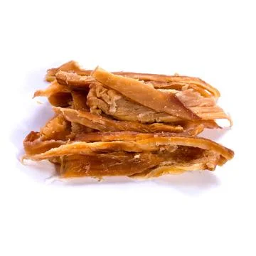Plast Squid with pepper on a white background. Snack Fish to beer. Close up Foto stock