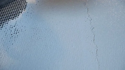 The plaster is applied to a special mesh. stains and coating texture Stock Footage 157428750