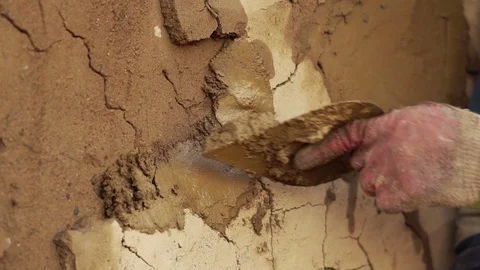 Plaster applies a layer of plaster Stock Footage 107596493