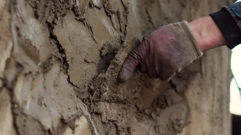 Plaster applies a layer of plaster Stock Footage 107598690