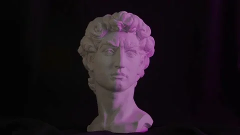 Plaster bust of david with colored light Stock Footage 163735168