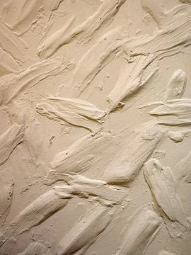 Plaster coating on the wall. Rough decorative plaster Stock Photos