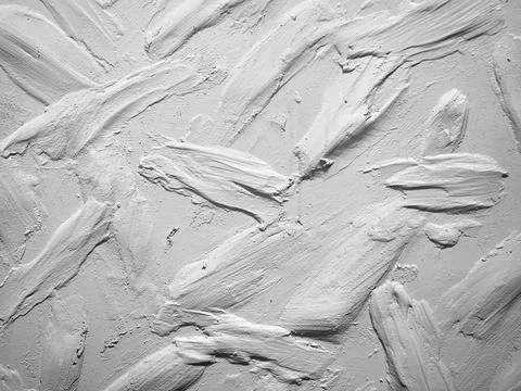 Plaster coating on the wall. Rough decorative plaster Stock Photos