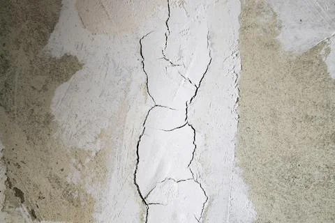 The plaster with cracked wall background Stock Photos