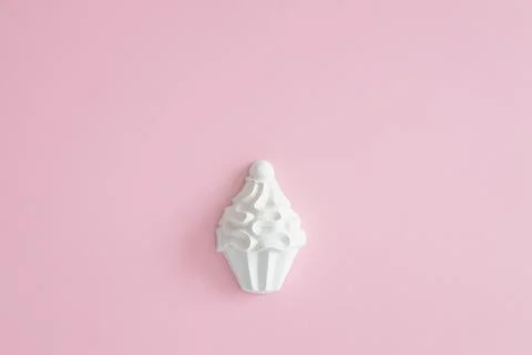 A plaster figure of a cake on a colored background Stock Photos