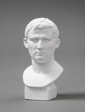 A plaster figure with a gray background Stock Photos