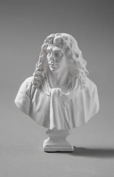 A plaster figure with a gray background Stock Photos