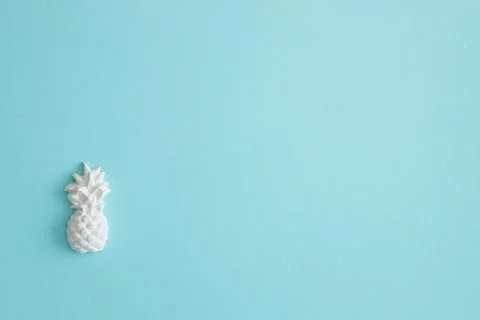 A plaster figure of a pineapple on a colored background Stock Photos