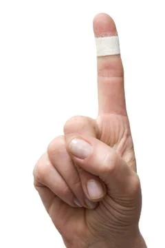 Plaster on the forefinger Stock Photos
