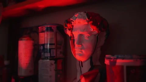 Plaster head drenched in paint Stock Footage 228980921