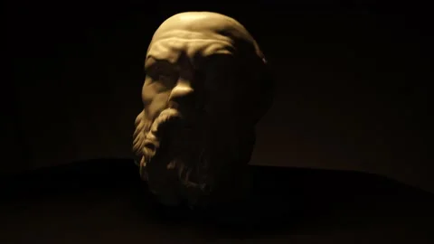 Plaster head on the table with beautiful shadows filmed around. Stock Footage 137661458