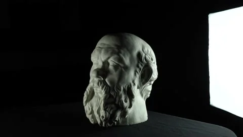 Plaster head in white on the table with beautiful shadows in high resolution. Stock Footage 137661376