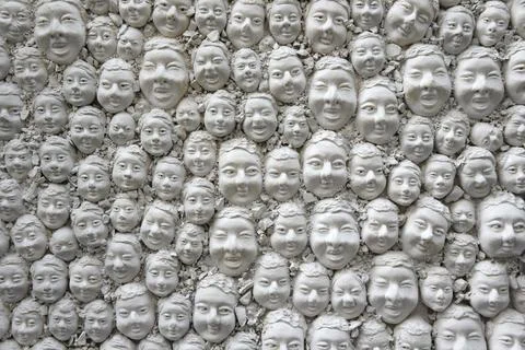 Plaster heads and faces two dimensional decoration in Funchal Madeira Portugal Stock Photos