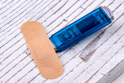 Plaster heals data stick for safer identity Stock Photos