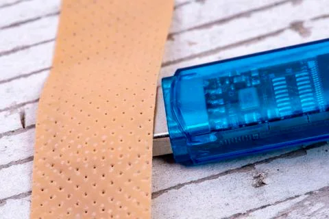 Plaster heals data stick for safer identity Stock Photos