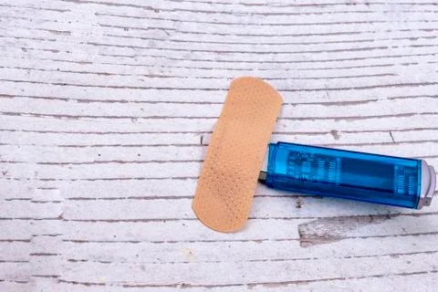 Plaster heals data stick for safer identity Stock Photos