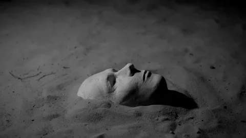 Plaster mask on the sand Stock Footage 102041130