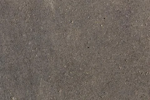 Plaster or cement texture dark gray color Stock Photos