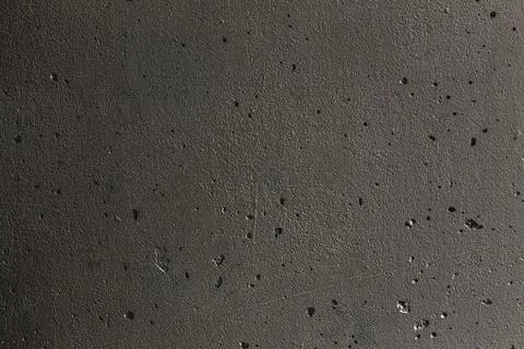 Plaster or cement texture dark gray color Stock Photos