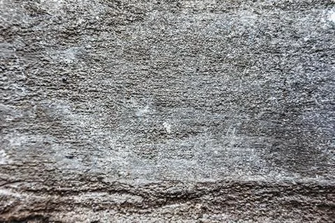 Plaster or cement texture dark gray color Stock Photos