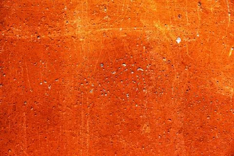 Plaster or cement texture orange color Stock Photos