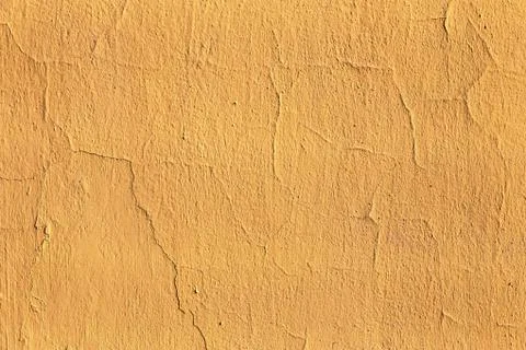 Plaster or cement texture yellow color Stock Photos