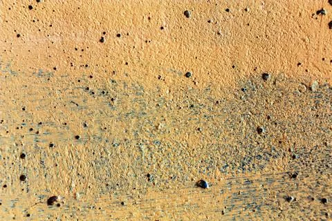 Plaster or cement texture yellow color Stock Photos