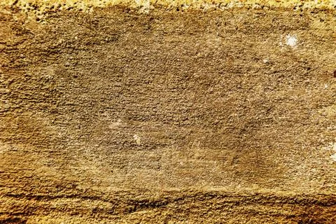 Plaster or cement texture yellow brown color Stock Photos