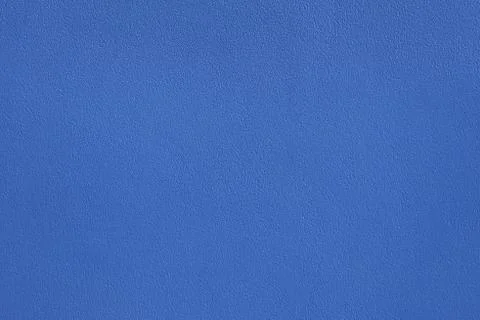 Plaster painted in blue, surface with original fine texture. Stock Photos