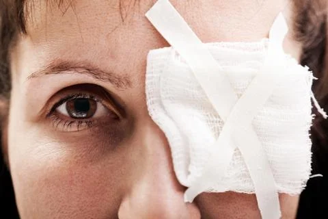 Plaster patch on wound eye Stock Photos