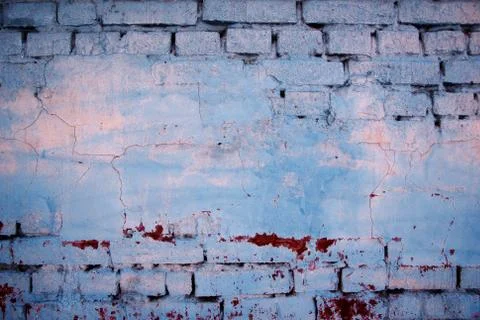 Plaster peeling off brick wall. Old Worn Down Brick Wall With Plaster. Stock Photos