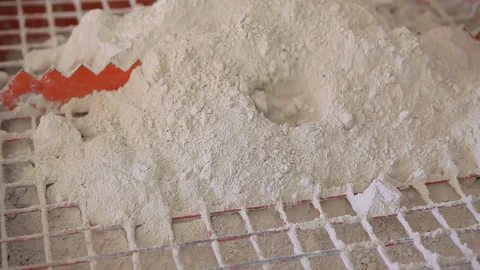 Plaster is poured into machine plaster Stock Footage 102166583