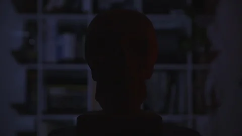 Plaster skull model for artists. Red color floats across the skull. Front face Stock Footage 124952097