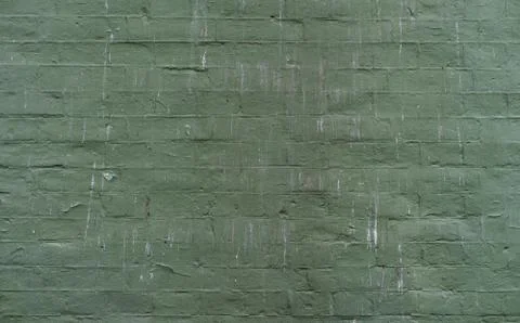 Plaster texture with deep facture painted in green color Stock Photos