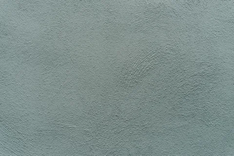 Plaster texture with deep facture painted in gray color Stock Photos