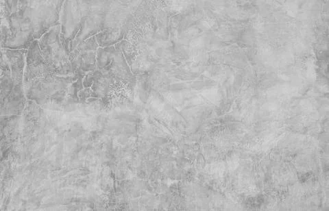 Plaster texture Rough with fine gray cracks for backdrop decoration. Stock Photos